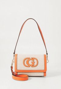 Beige fabric handbag with orange leather accents, logo appliqué, slim shoulder strap, and zip closure. Features contrast stitching and patterned texture.