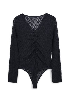 Body in pizzo nero con maniche lunghe, scollatura a V e dettagli arricciati sul davanti. Motivo in pizzo strutturato su tutta la superficie, forma aderente.