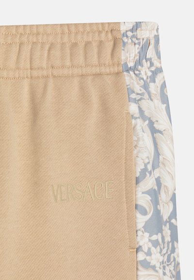 Versace BAROCCO KIDS EMBROIDERY UNISEX - Tracksuit bottoms - sand castle
