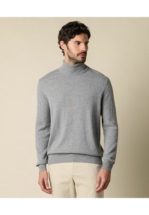 Maglione grigio a collo alto realizzato in un tessuto morbido, con maniche lunghe e orlo a coste. Il design è aderente con una superficie liscia.