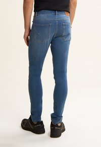 Freddy IN BULL ELASTICIZZATO - Pantalones - jeans chiaro-cuciture beige