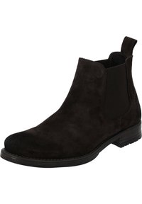 Bottines Chelsea en suède noir avec des panneaux élastiques sur les côtés, bout rond et petit talon empilé. Caractéristiques d'une texture lisse et d'un minimalisme dans les détails.