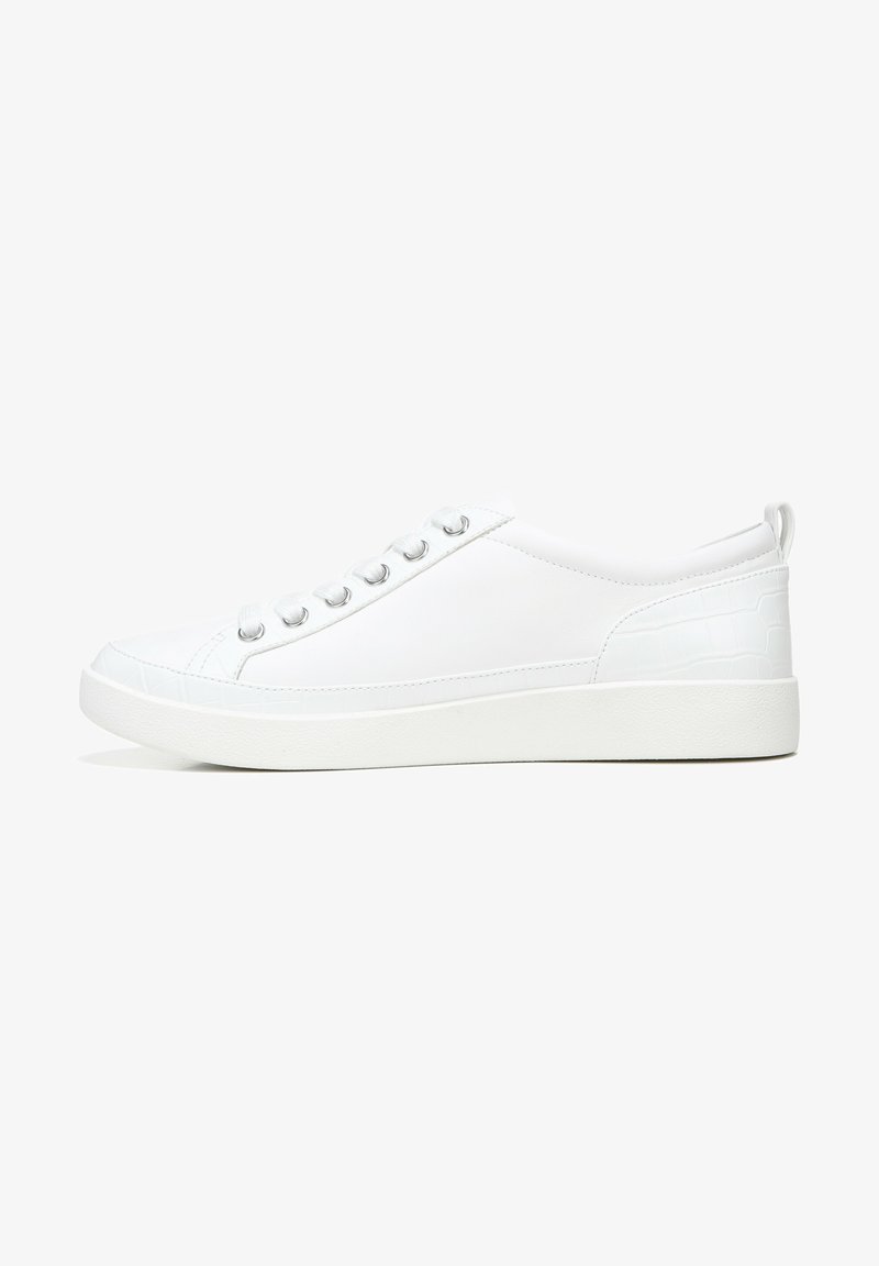 White sneaker made of smooth synthetic material with a textured crocodile pattern on the heel. Features metallic eyelets and a rounded toe.