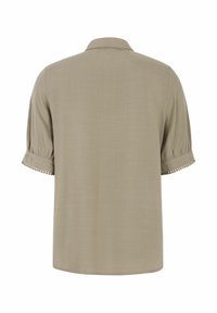 Košulja s kratkim rukavima u svijetlo maslinastoj boji, s glatkim, teksturiranim materijalom i dekorativnim rubovima na rukavima. S ovratnikom, opuštenog kroja.