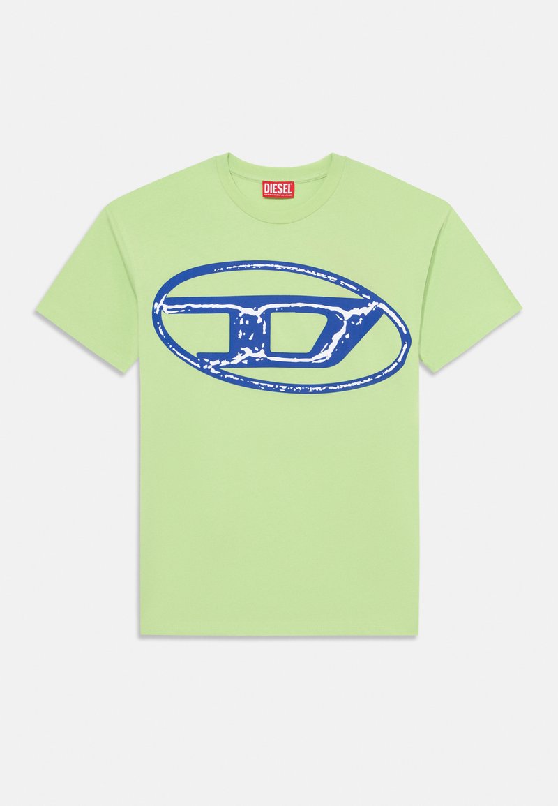 T-shirt de algodão verde-claro com um grande design oval gráfico azul. A camiseta tem decote redondo e mangas curtas.