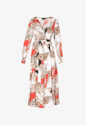 Ilga rankovė, grindis dengiantis suknelė balta spalva su raudonais ir auksiniais gėlių raštais. Įeina diržas juosmeniui ir turi V formos iškirptę.