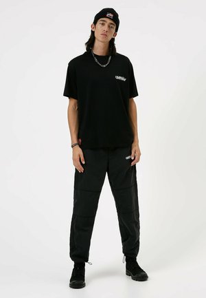 XERTERE - Bonnet - black