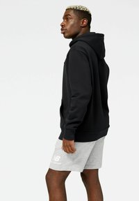 New Balance Felpa con cappuccio - black