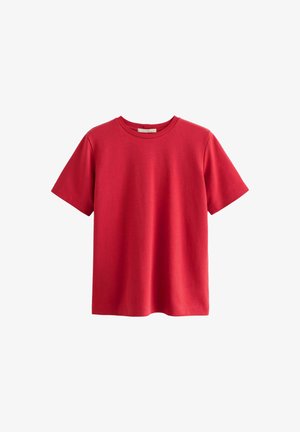 Tricou scurt roșu din bumbac, cu manșete scurte, de tip crew neck, cu o croială lejeră și o textură netedă, fără modele sau accente vizibile.