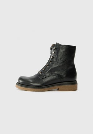 TRISKA - Ankle boots - black