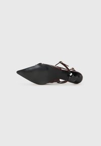 High-heeled shoe with a pointed toe, burgundy patent leather upper, black synthetic sole, and buckle accent on adjustable strap.