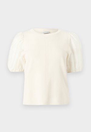 Κρεμ μπλούζα με κοντό μανίκι, φουσκωτά μανίκια και λεπτή κάθετη ραφή στο κέντρο μπροστά.