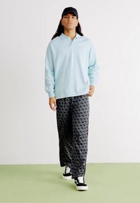 Puma Poloshirt - turquoise surf