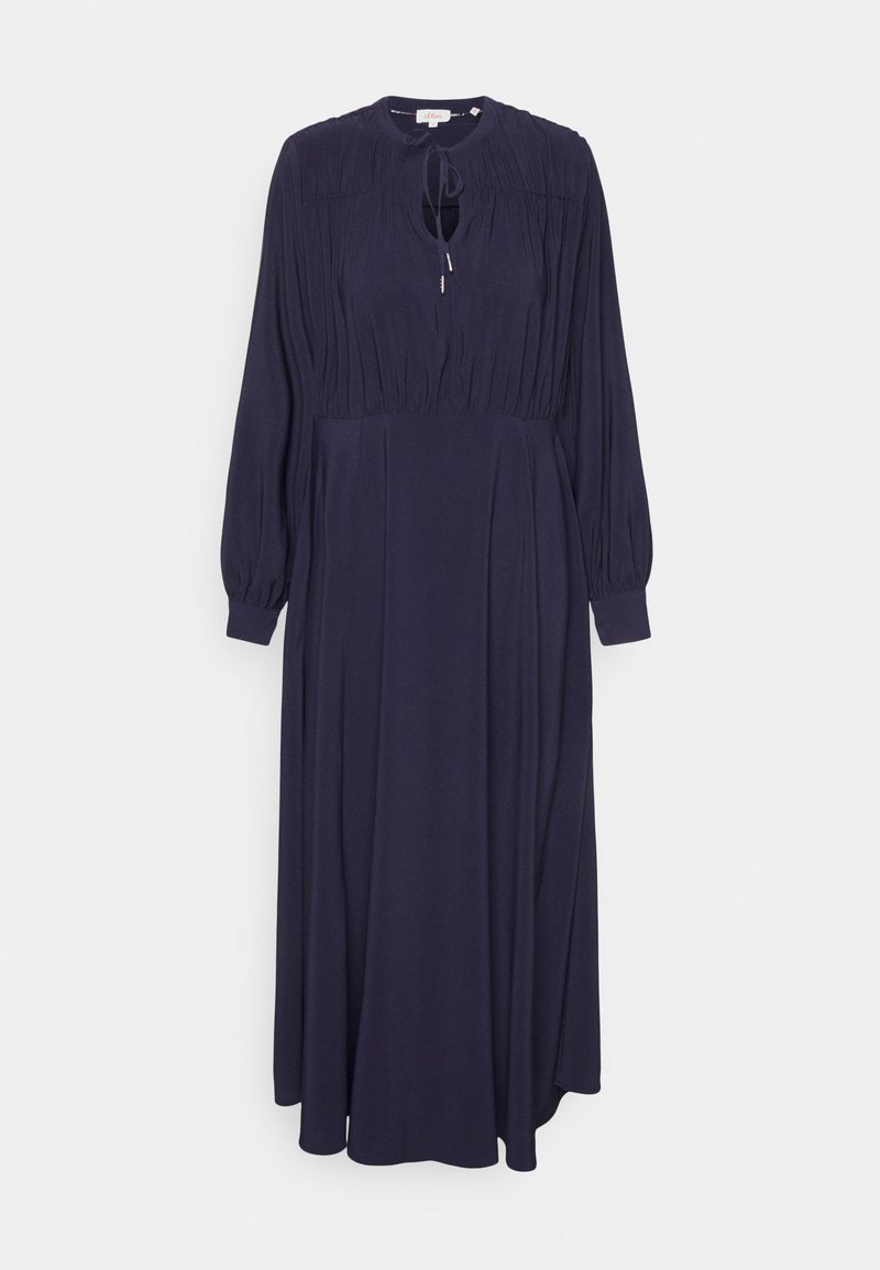 Robe longue bleu marine à manches longues, en tissu doux, avec des détails froncés autour de l'encolure et des poignets élastiqués. Silhouette en A.