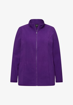 Veste en polaire violette avec un col haut, une fermeture éclair à l'avant et des poches latérales. Le tissu est doux et a une texture lisse.