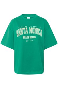 Zelené bavlněné tričko s kulatým výstřihem a oversized střihem. Na tričku je nápis "SANTA MONICA STATE BEACH EST. 1909" v kontrastní bílé barvě.