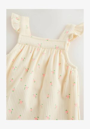 Haljina bez rukava u krem boji s vertikalnim prugama, ukrašena cvjetnim uzorkom u ružičastoj i zelenoj boji. Naborani naramenice dodaju detalj.