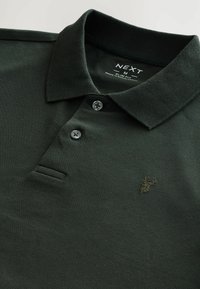 - Koszulka polo