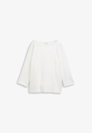 Biała, długoskrzydła bluzka wykonana z teksturowanej dzianiny. Ma szeroki, okrągły dekolt i luźny krój, a rękawy sięgają poniżej łokcia.