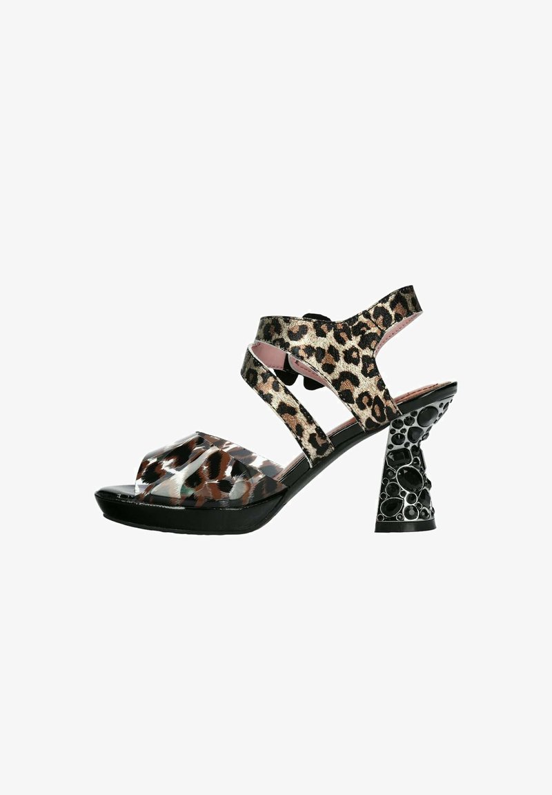Sandale à talons hauts pour femmes avec brides imprimé léopard, bout ouvert et talon carré noir à motif.