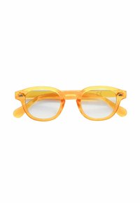 Occhiali da sole arancioni traslucidi con montatura rotonda, lenti gialle e aste dritte. Presentano un dettaglio decorativo sulle tempie.