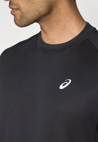 ASICS COURT TOP - Športové tričko - performance black