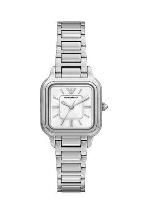 Eine silberne Armbanduhr aus Edelstahl mit quadratischem Zifferblatt, weißem Perlmutt-Ziffernblatt, silbernen Stundenmarkierungen und einem Gliederarmband.