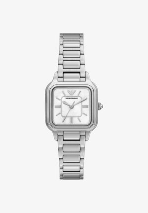 Eine silberne Armbanduhr aus Edelstahl mit quadratischem Zifferblatt, weißem Perlmutt-Ziffernblatt, silbernen Stundenmarkierungen und einem Gliederarmband.