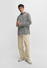 HUGO GETRO251D - Jeans straight leg - beige nine