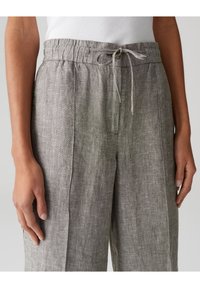 Lichtgrijze linnen broek met een elastische tailleband en te trekken koord, met een relaxte pasvorm en subtiele textuur overal.