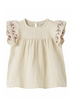 Babykjole i cremefarve med kort flæseærme broderet med pink og grønne blomster.