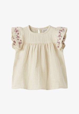 Βρεφικό φόρεμα σε κρεμ χρώμα με κοντά μανίκια με βολάν, κεντημένα με ροζ και πράσινα λουλουδένια σχέδια.