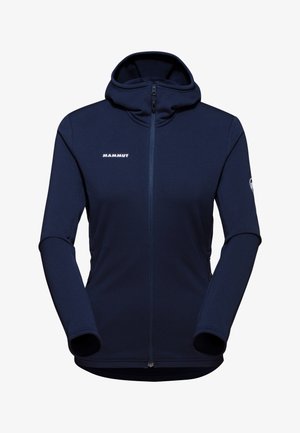 Marineblå fleecejakke med hætte, fuld lynlås og logo på brystet. Har sidelommer og tilpassede ærmer med bløde manchetter.