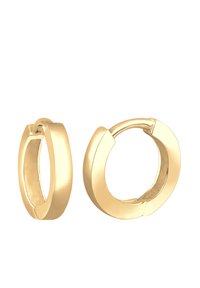 Boucles d'oreilles en or avec une finition lisse et polie, d'un design moderne et épuré. Une boucle est ouverte tandis que l'autre est fermée.