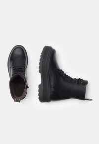NeroGiardini Stivaletti con plateau - black