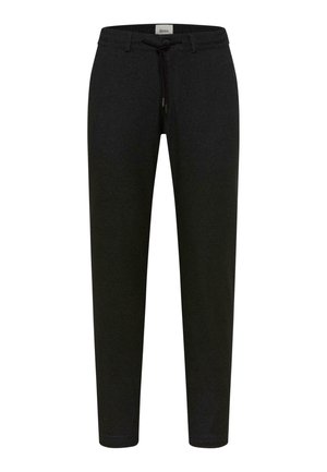 Black jogger pants made of textured fabric, featuring an elastic waistband with a drawstring and tapered ankle cuffs.