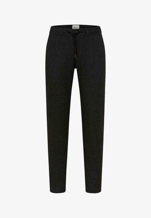 Pantalons de jogging noirs en tissu texturé, dotés d'une taille élastique avec un cordon de serrage et des poignets effilés.
