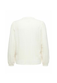 Pull en maille blanc à manches longues avec motifs torsadés et épaules légèrement bouffantes, vu de dos sur un fond uni.