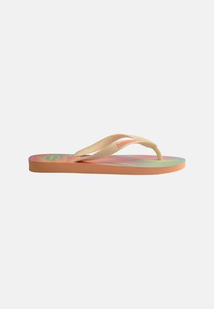 Flat rubber flip-flop with beige straps and colorful gradient sole featuring text and logo, shown from side view on a white background.