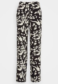 Black and white patterned pants with a loose fit, featuring a mix of abstract shapes on a lightweight fabric. Elastic waistband, straight legs.