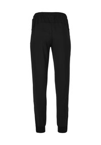 Sorte joggingbukser med elastisk talje, tapered ben design og ribbede manchetter ved anklerne. Glat tekstur, ingen synlige mønstre.