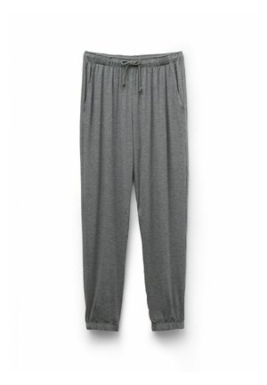 Pantalones de chándal grises con cintura elástica, cordón, bolsillos laterales y puños elásticos en los tobillos sobre fondo blanco.