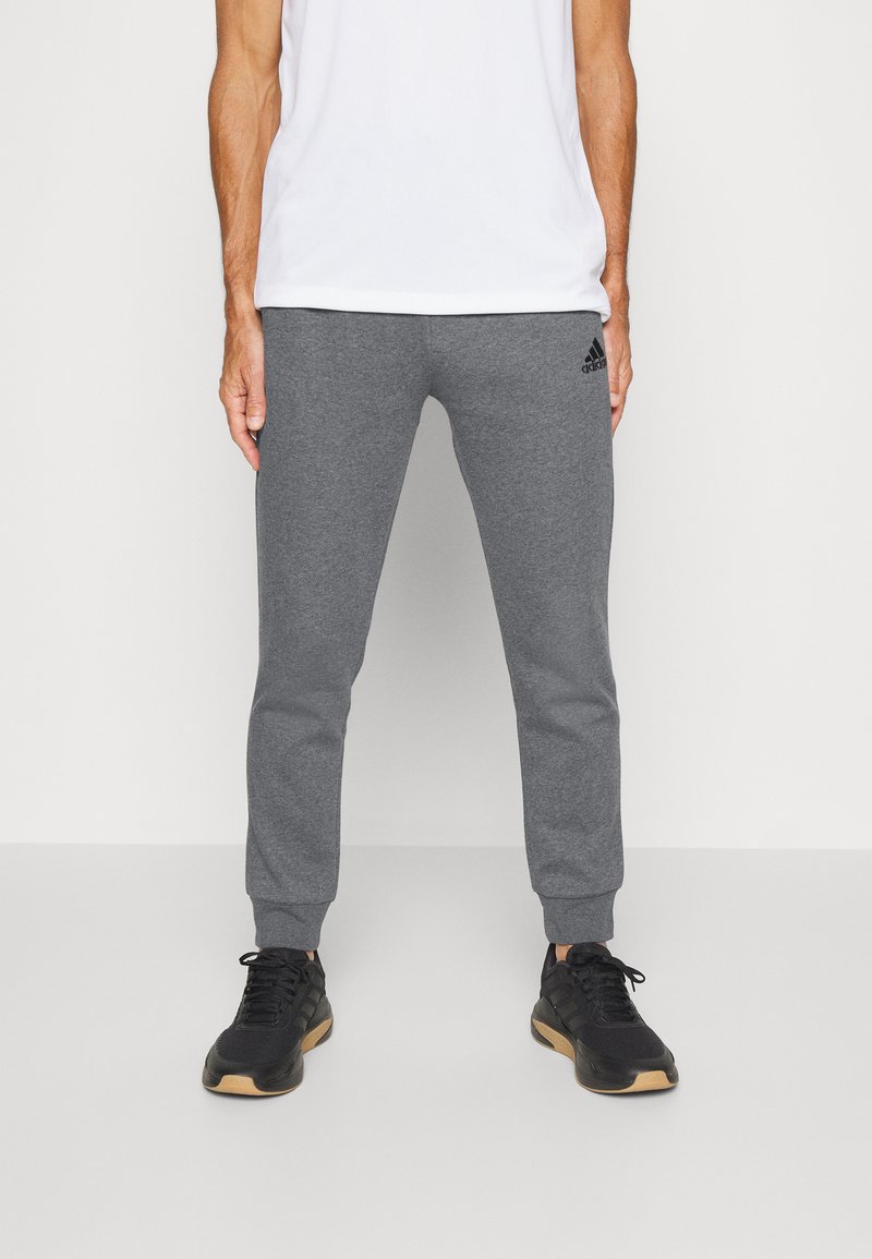 adidas Sportswear FEELCOZY - Pantalones deportivos - dark grey heather/black