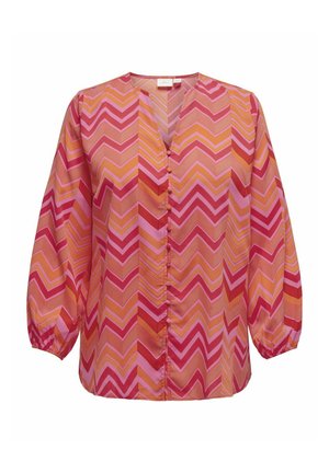 Hosszú ujjú blúz V-nyakkivágással, rózsaszín és narancssárga cseppmintával, gombos részletekkel az elülső részen és redős ujjakkal.