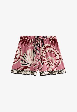 Pantalones cortos de tela rosa con un gran patrón abstracto de flores en crema y burdeos oscuro. Cintura elástica con cordón y dobladillo en forma de ondas.