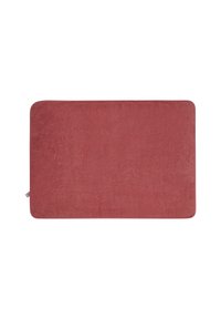 Rectangular bath mat in a soft, textured fabric, deep rose color with rounded corners and a subtle sheen. Compact design suitable for various spaces.