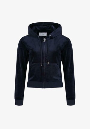 Felpa zip con cappuccio in velour blu navy, dotata di tasca frontale, polsini e orlo a costine. Presenta un piccolo logo sul lato sinistro del petto.