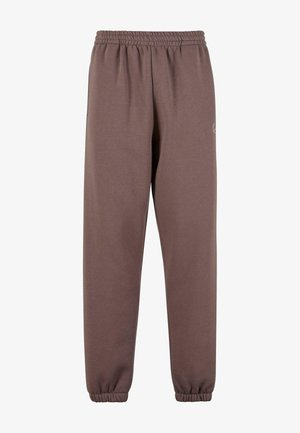 Pantalon de survêtement marron avec taille élastique et poignets élastiques aux jambes, design simple et texture de tissu douce.