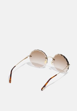 CHLOÉ ROSIE RIMLESS ROUNDED METAL SUNGLASSES - Zonnebril - gold-coloured/brown
