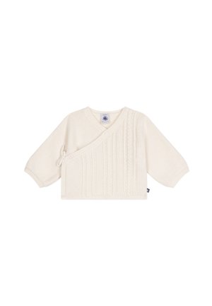 Pull bébé tricoté couleur crème avec devant croisé, manches longues, fermeture latérale à nouer et motif torsadé vertical sur le devant.